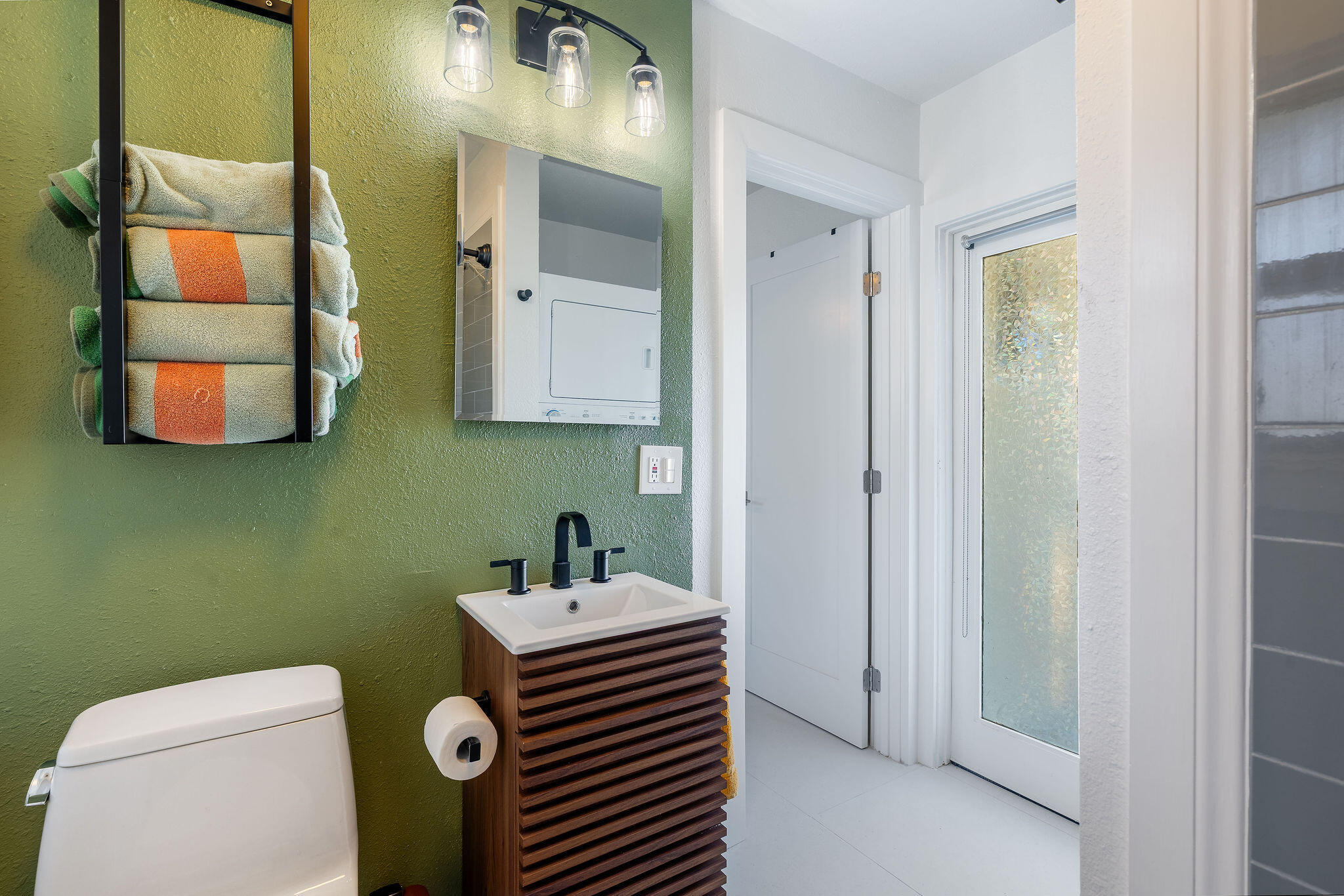 1125 East Sunny Dunes Road Palm Springs, CA 92264 - Photo 32 of 67 Ensuite Bath/Laundry