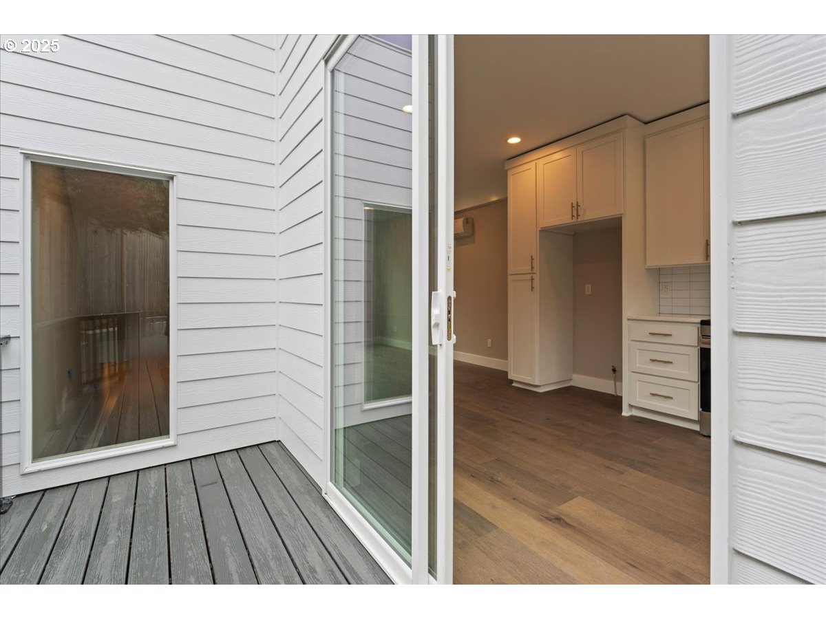 9824 Southwest 34th Place Portland, OR 97219 - Photo 7 of 19 a view of wooden floor in an empty room