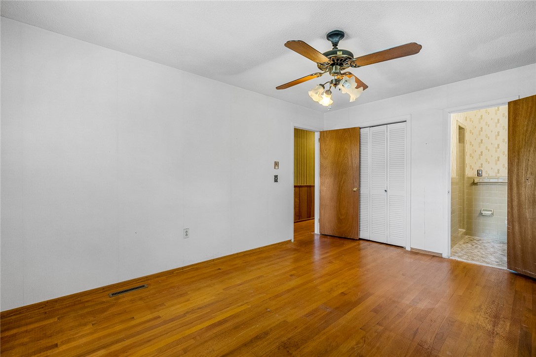 2101 Old Spring Drive Anderson, SC 29625 - Photo 15 of 36 Hardwood floors and a ceiling fan create a comfortable atmosphere.