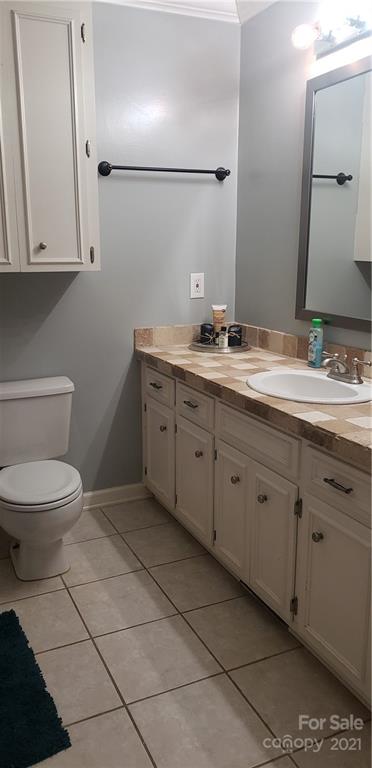 650 Monticello Road Lancaster, SC 29720 - Photo 11 of 25 a spacious bathroom with a toilet sink and mirror