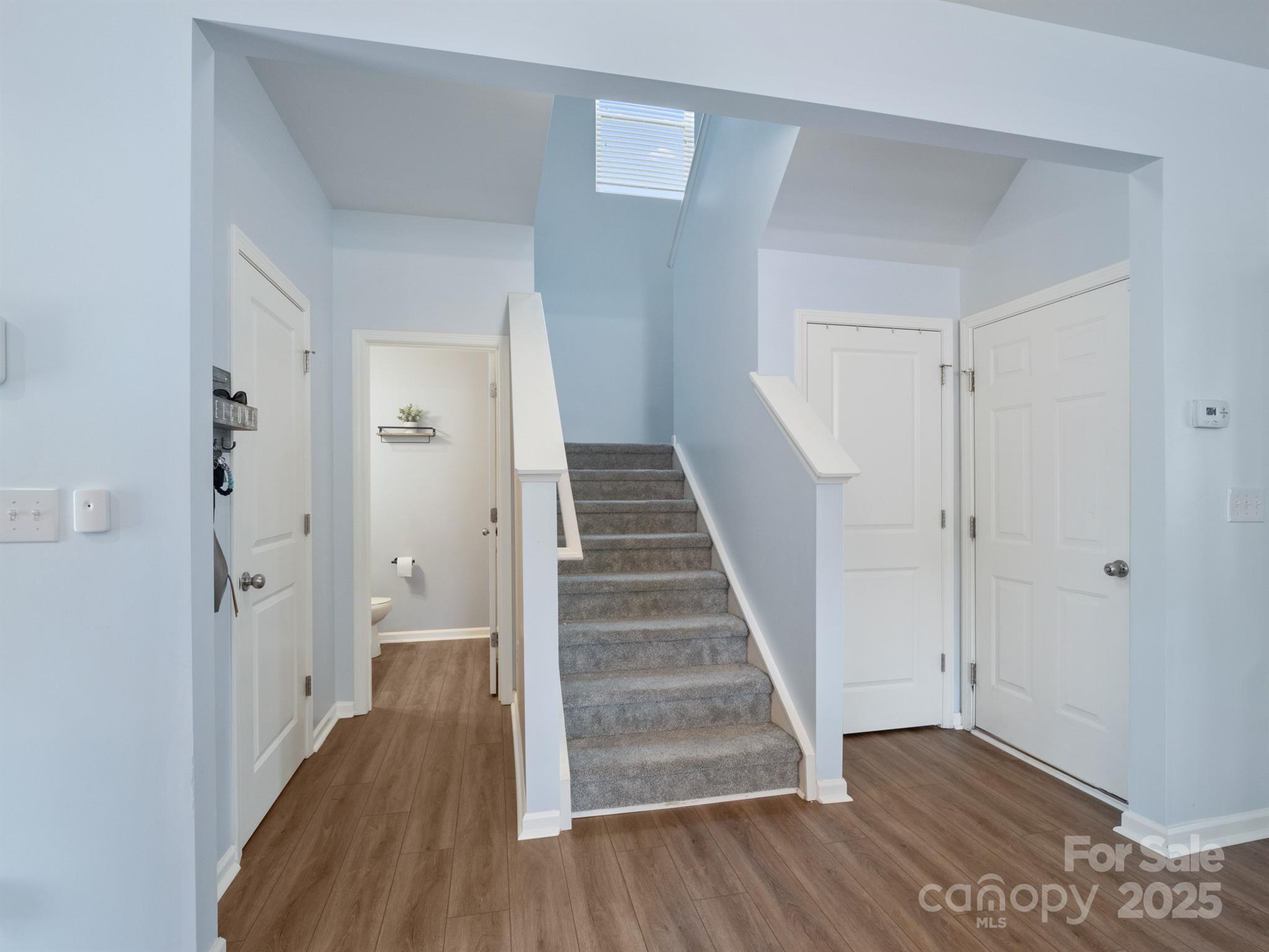 629 Gants Road York, SC 29745 - Photo 13 of 28 a view of a hallway with wooden floor and entryway
