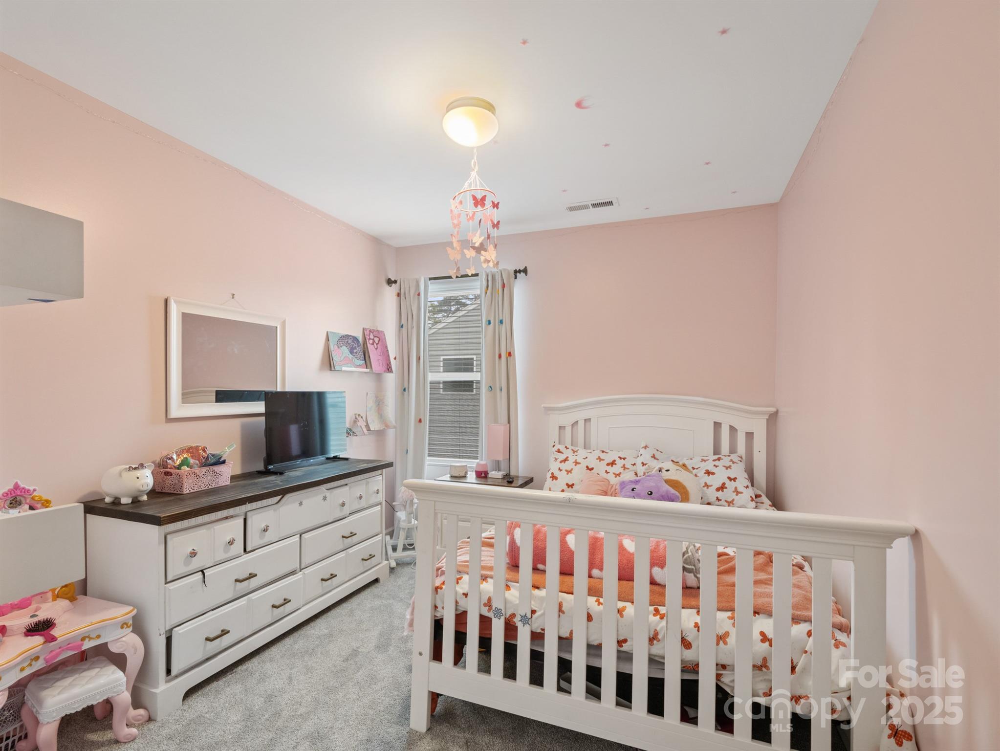 629 Gants Road York, SC 29745 - Photo 20 of 28 a bedroom with a bed and a dresser in it