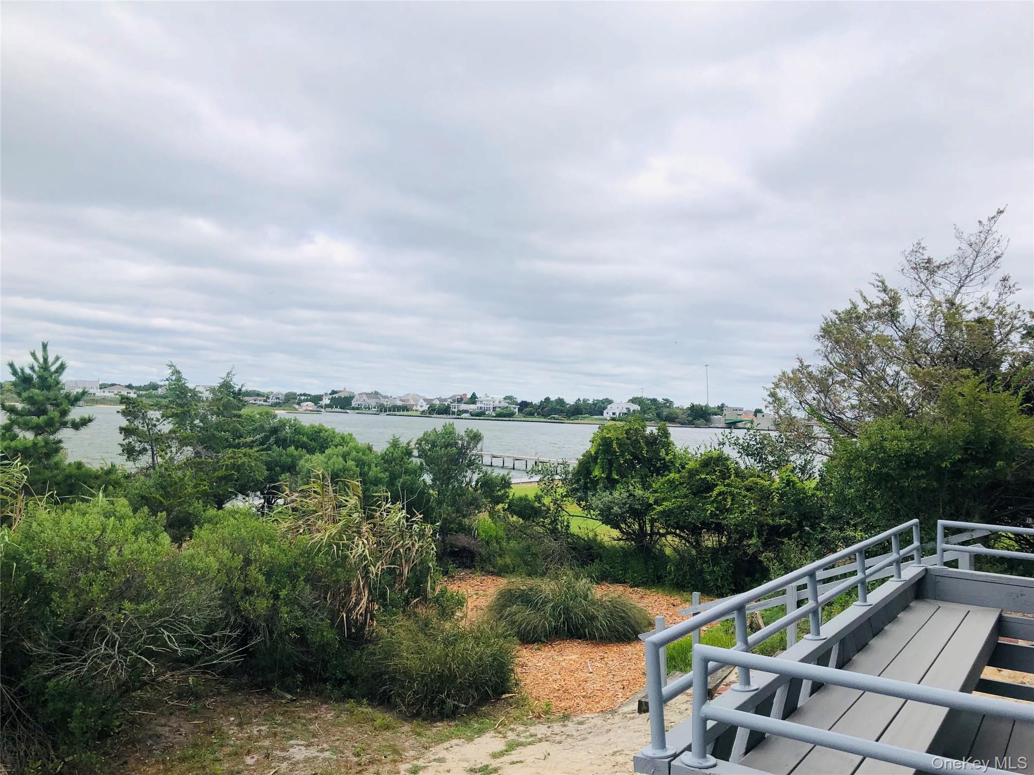 274 Dune Road Westhampton Beach, NY 11978 - Photo 13 of 14 view of city from balcony with seating space
