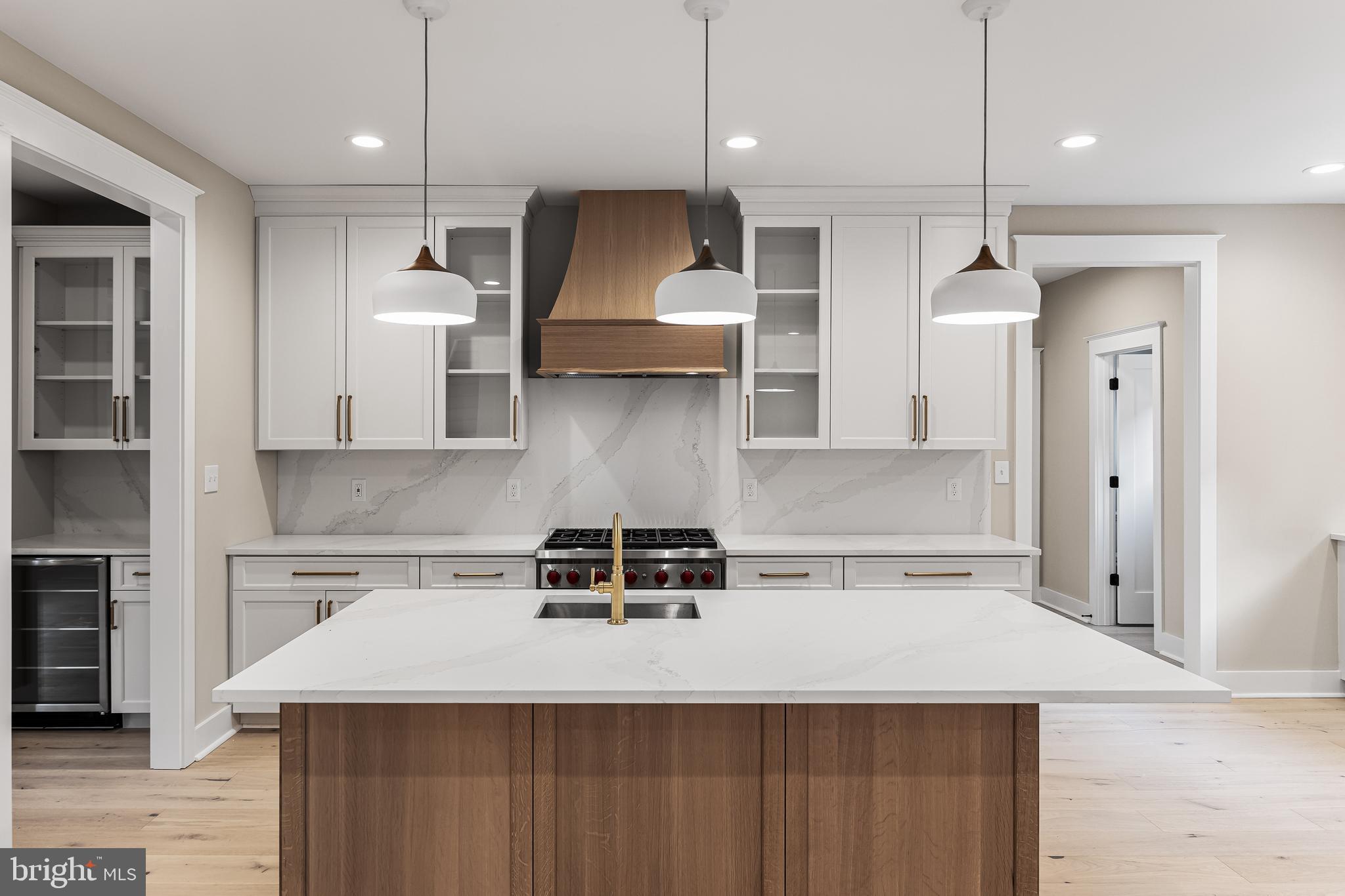 301 Centre Street Haddonfield, NJ 08033 - Photo 14 of 64 a kitchen with a stove a refrigerator and a sink