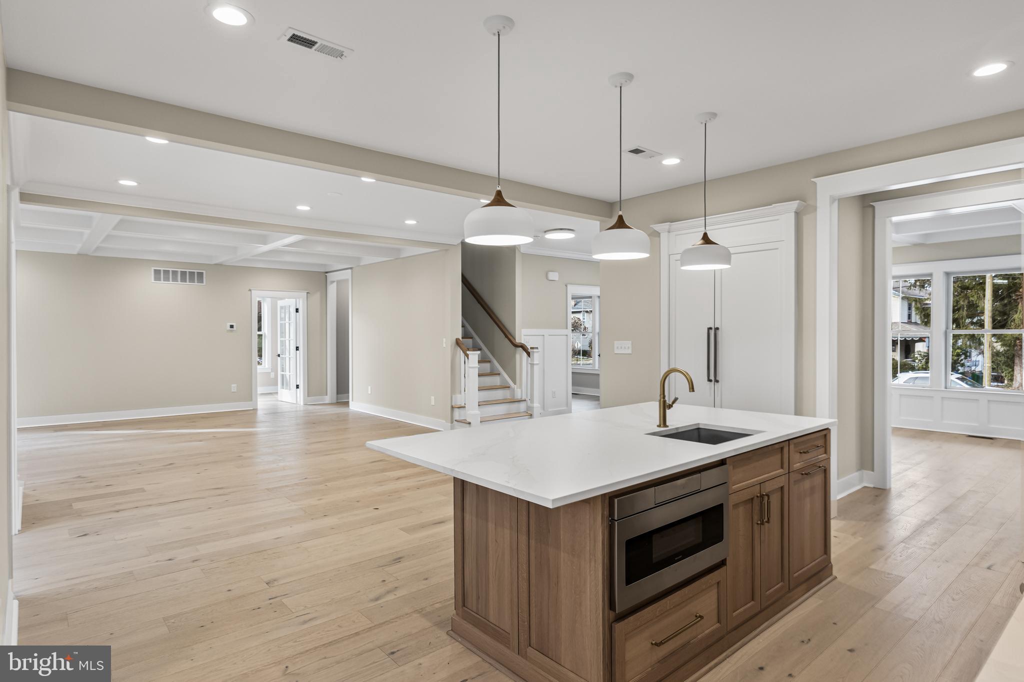 301 Centre Street Haddonfield, NJ 08033 - Photo 23 of 64 a kitchen with a sink and a stove top oven