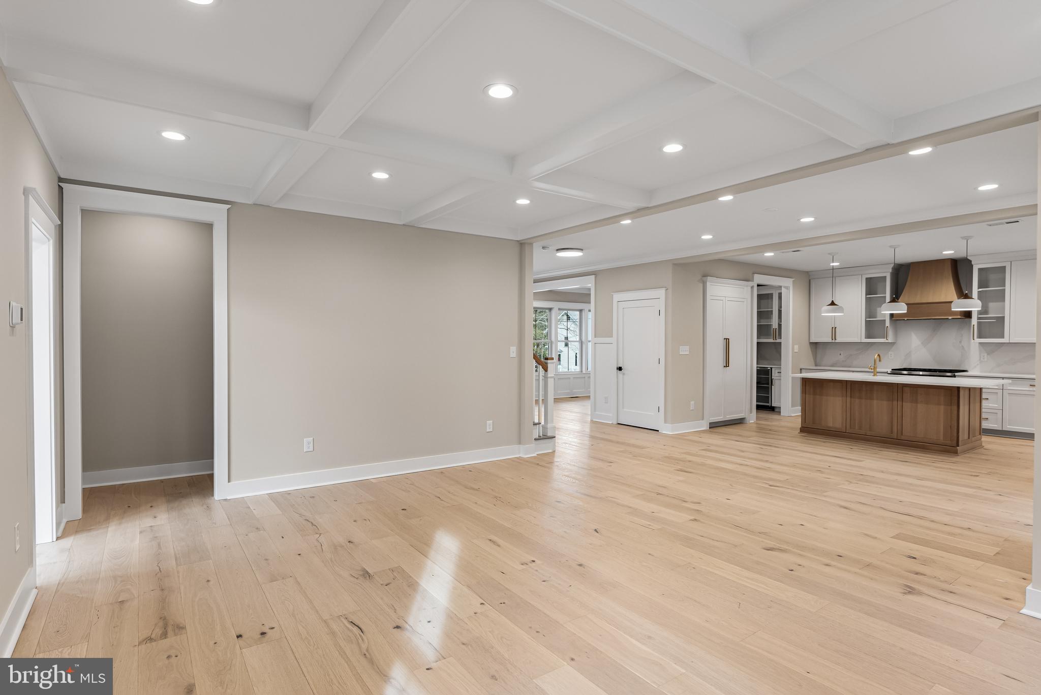 301 Centre Street Haddonfield, NJ 08033 - Photo 29 of 64 a view of a kitchen with kitchen island a sink wooden floor and a refrigerator