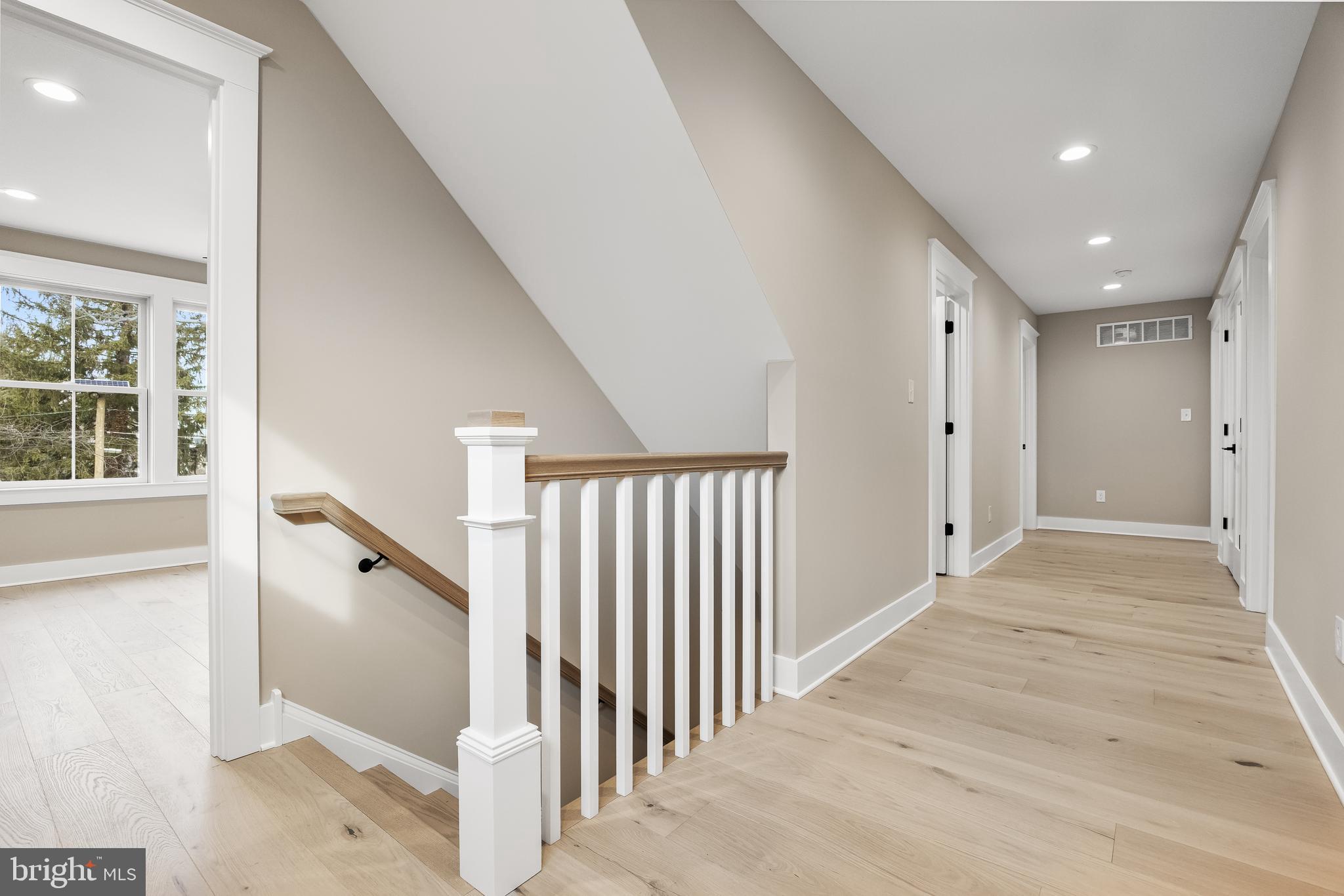 301 Centre Street Haddonfield, NJ 08033 - Photo 34 of 64 a view of a hallway with windows and stairs