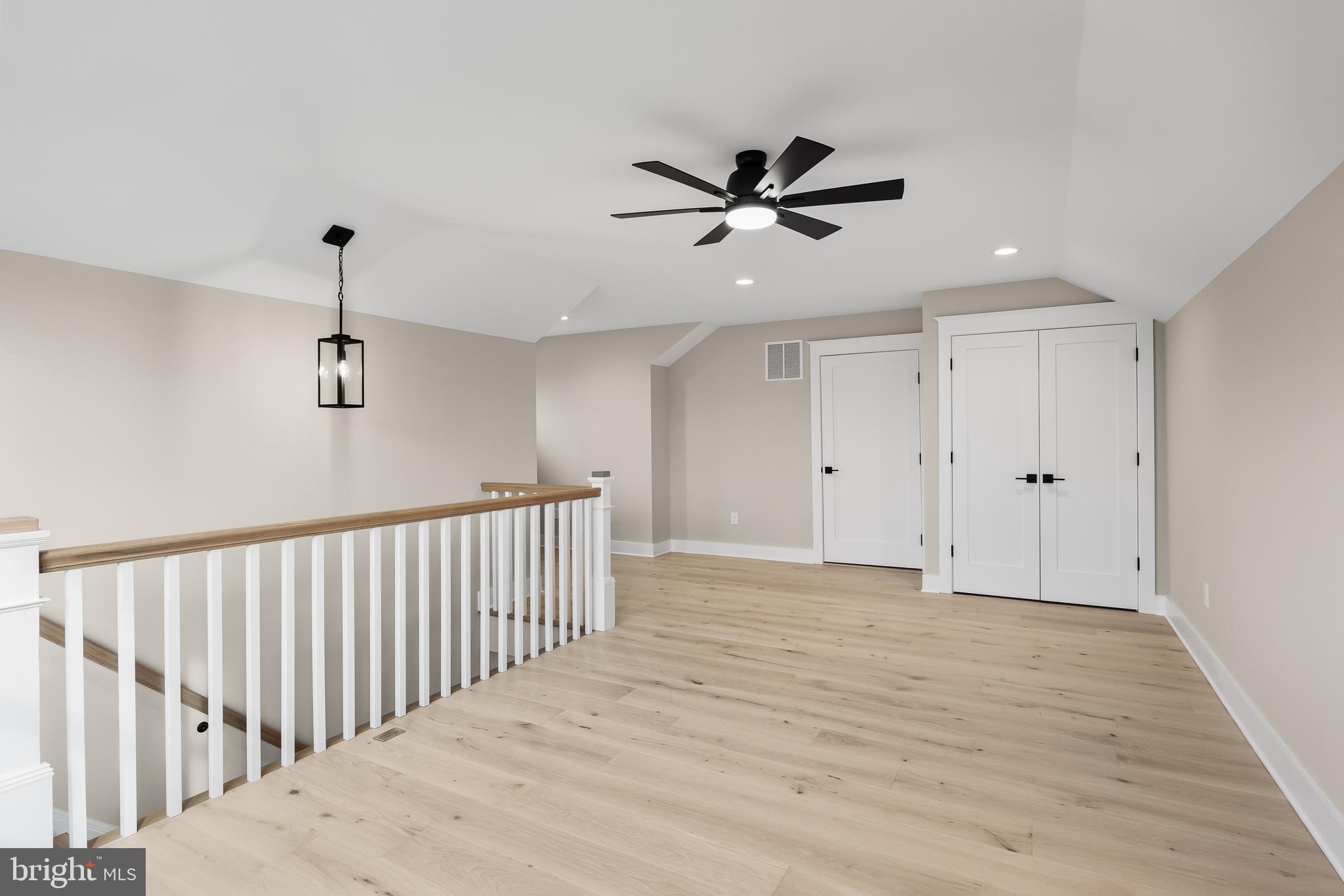 301 Centre Street Haddonfield, NJ 08033 - Photo 53 of 64 a view of a room with wooden floor closet and windows