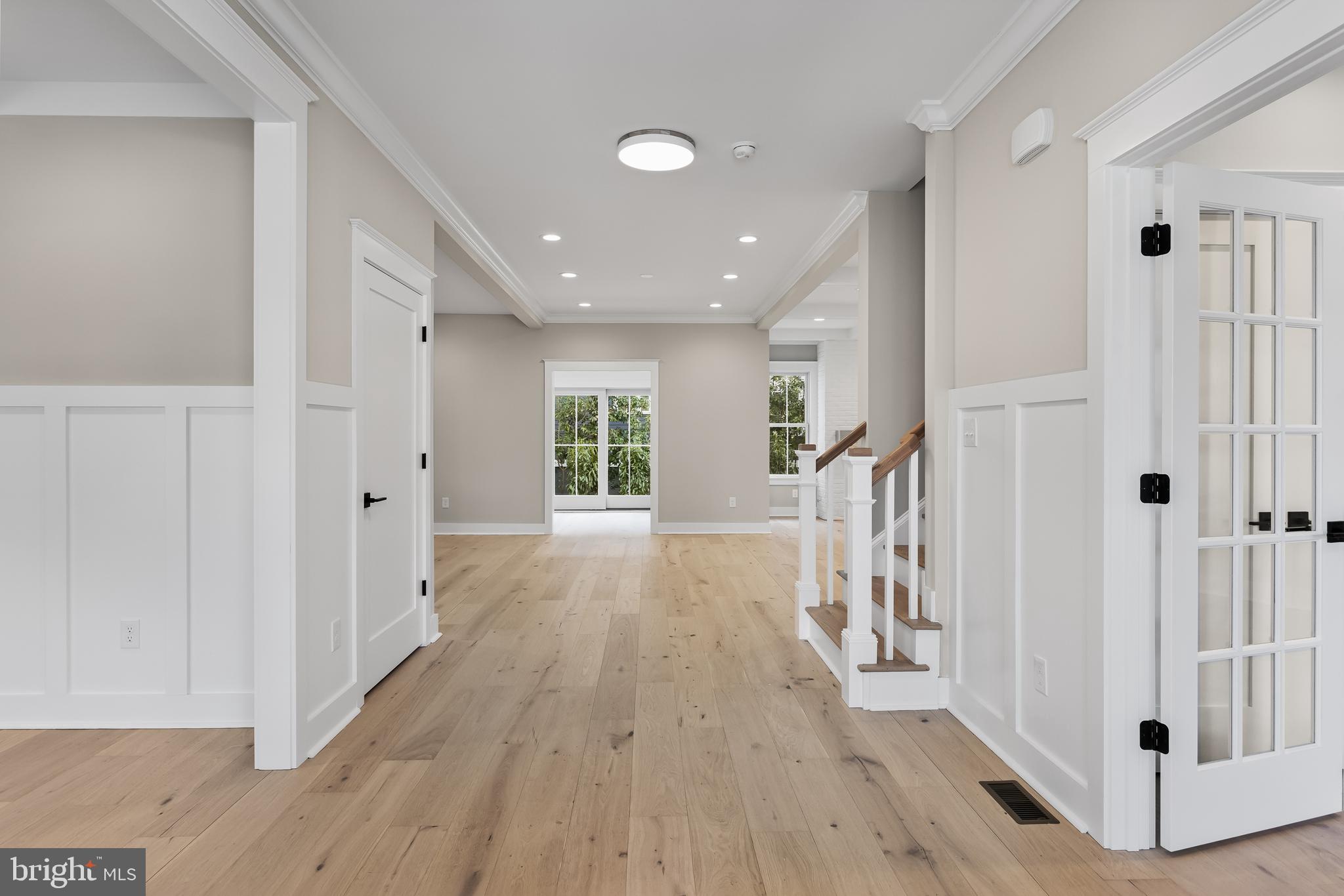 301 Centre Street Haddonfield, NJ 08033 - Photo 8 of 64 a view of a hallway with wooden floor and entryway