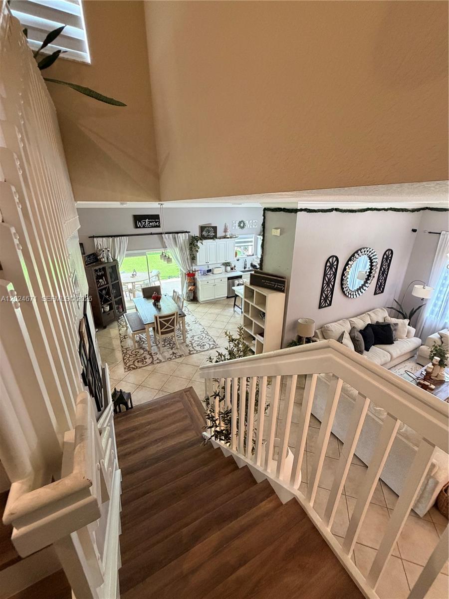 2116 Northeast 38th Road, Unit 2116 Homestead, FL 33033 - Photo 5 of 31 a view of a chairs and table in the balcony