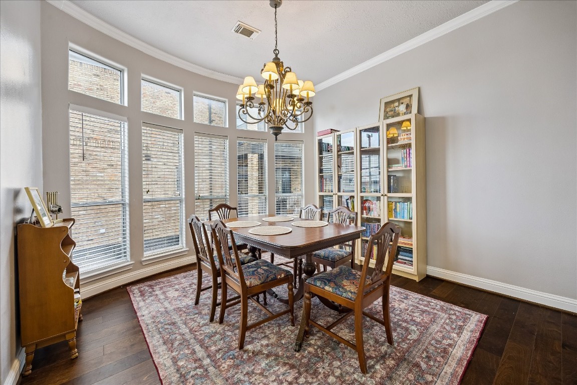 1304 Dart Street, Unit F Houston, TX 77007 - Photo 7 of 13 a view of a dining room with furniture window and wooden floor