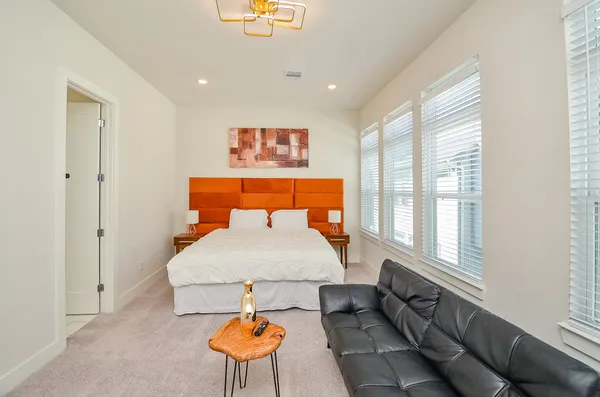 a room with furniture and a large window