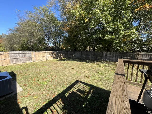 a view of swimming pool with seating area