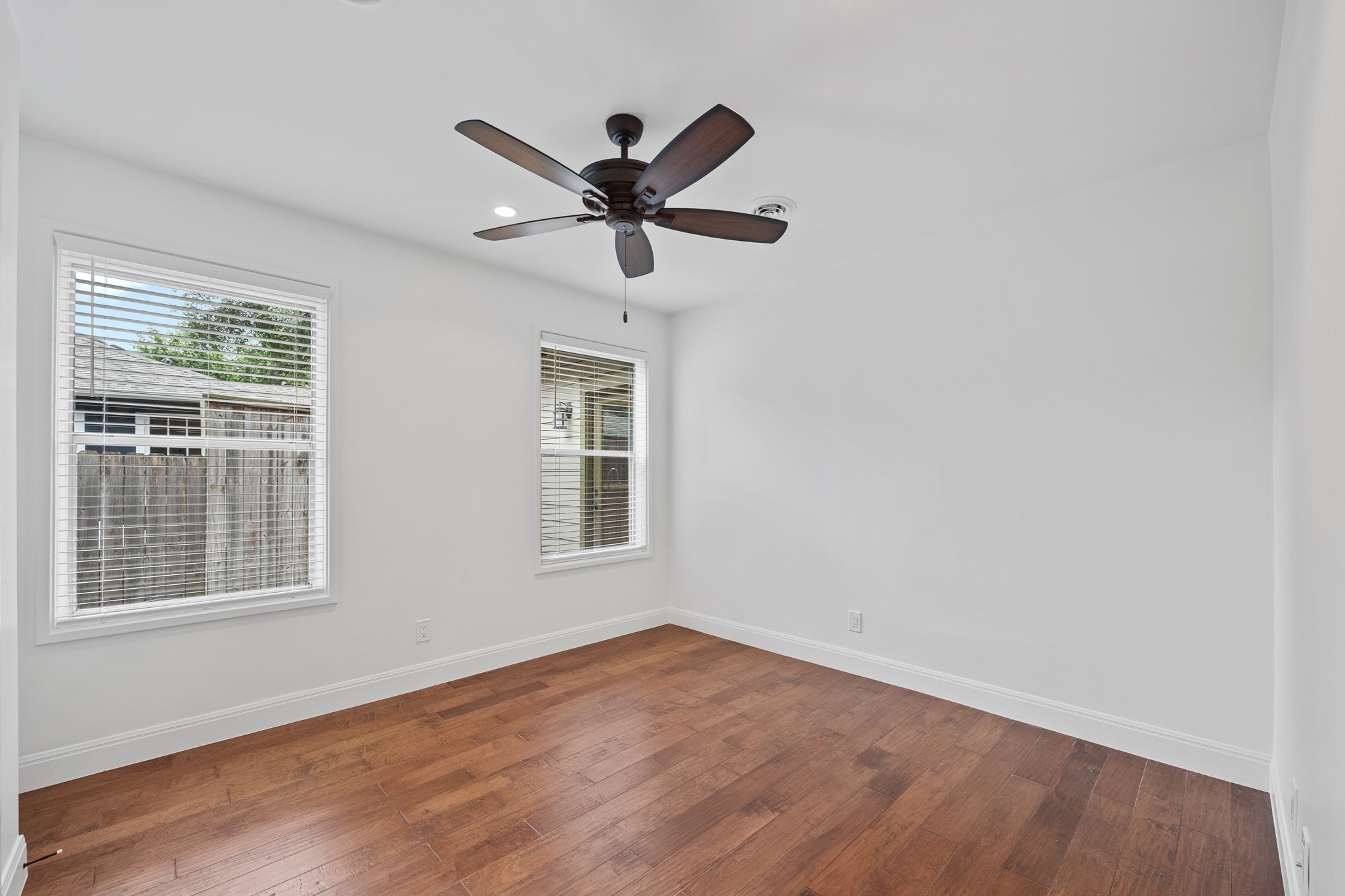 3205 Gilbert Street Austin, TX 78703 - Photo 20 of 35 Bright interior space featuring wood-finish flooring and a ceiling fan