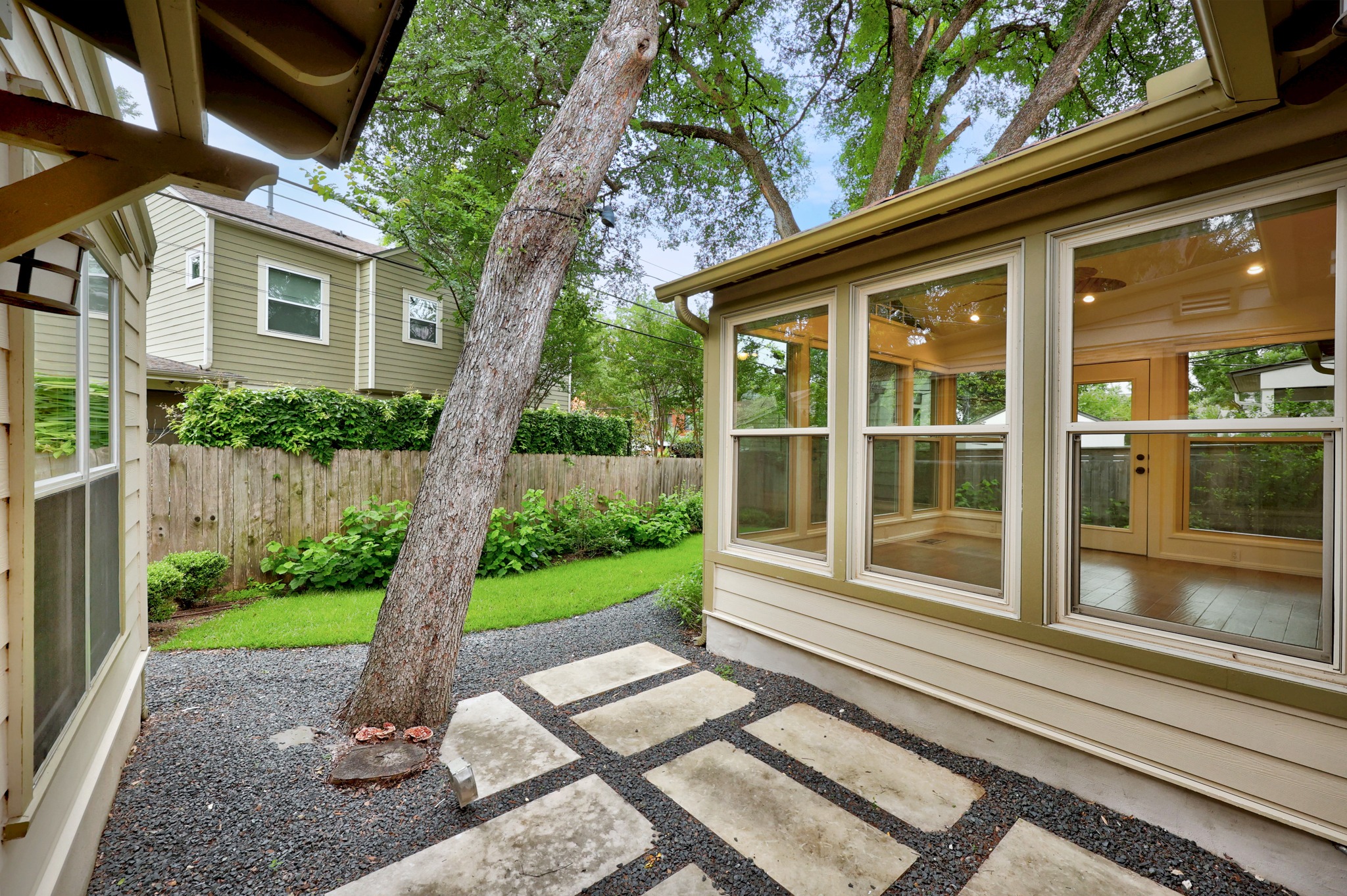 3205 Gilbert Street Austin, TX 78703 - Photo 33 of 35 Sunroom with wood-finish flooring and multiple large windows