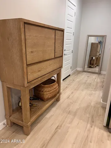 a view of a room that has a large window