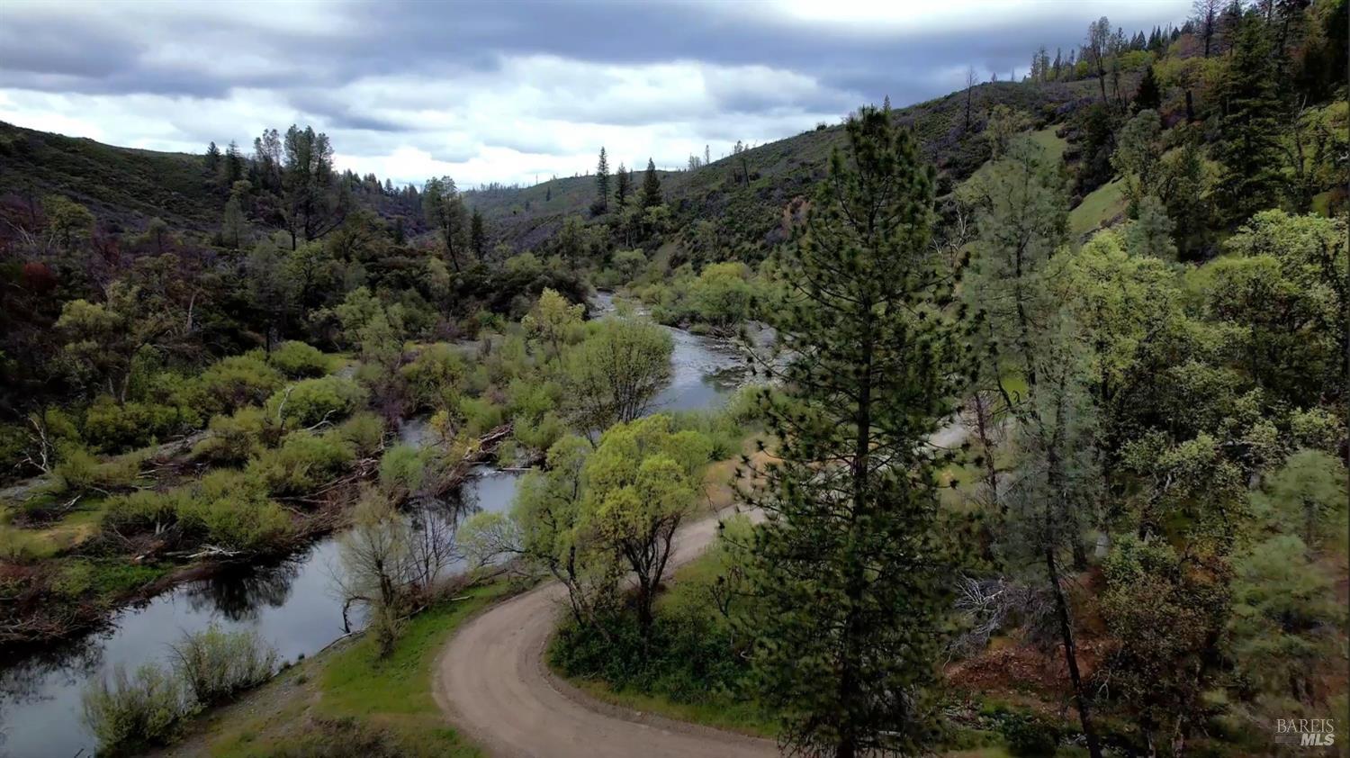 2168 Bear Creek Road Upper Lake, CA 95485 - Photo 14 of 16 a view of a lake with a city