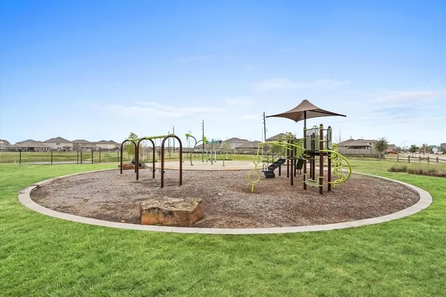 a view of a lake with a yard