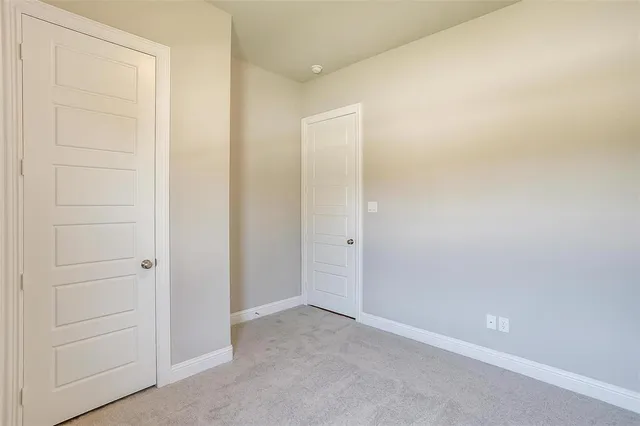 an empty room with closet
