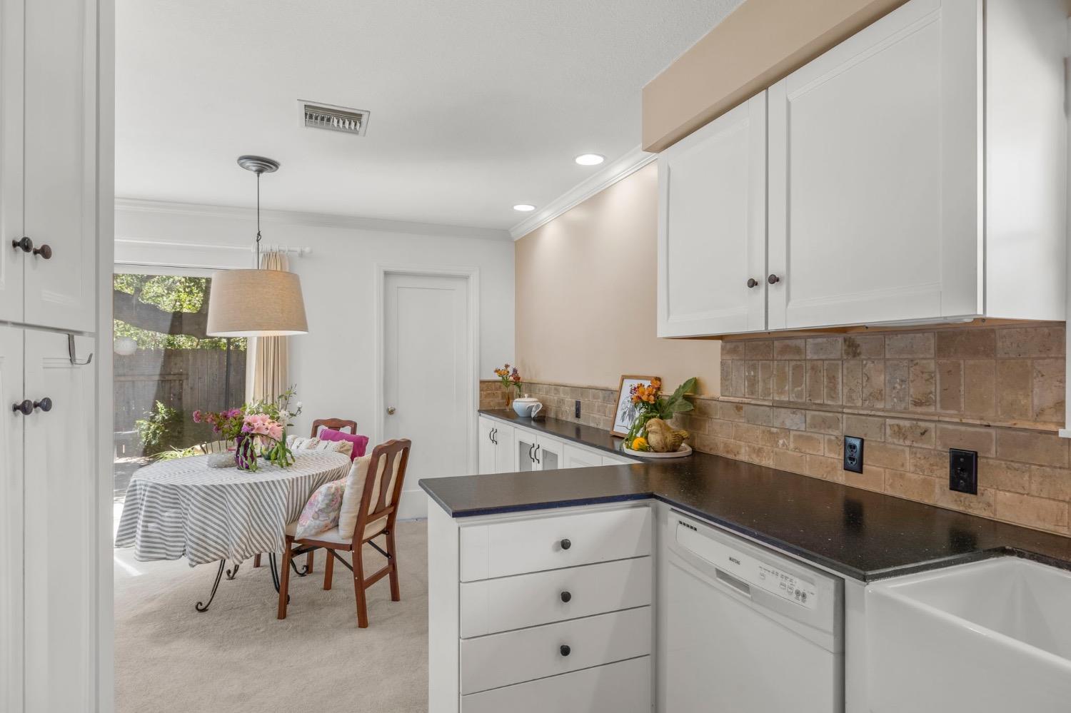 1314 Meadowbrook Road Ojai, CA 93023 - Photo 11 of 40 a kitchen with a sink cabinets and window
