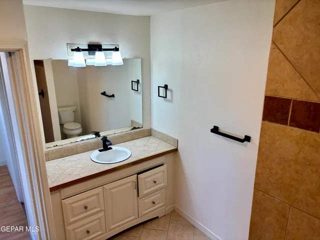 a view of a kitchen with a sink
