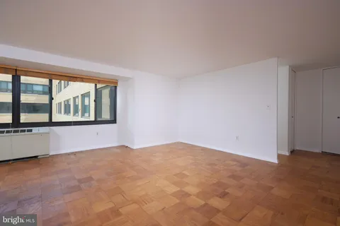 a view of a room with a large window