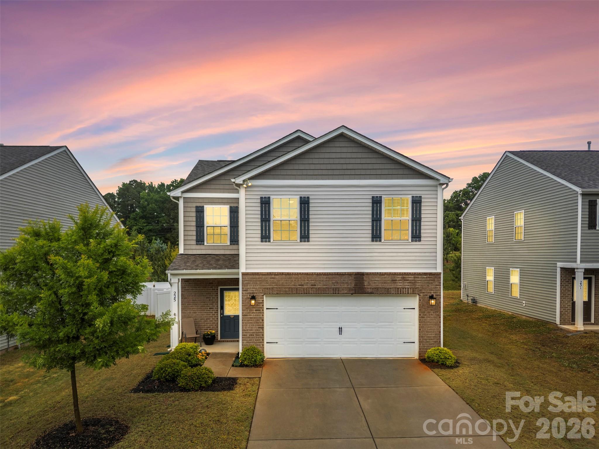 225 Final Stretch Lane Clover, SC 29710 - Photo 1 of 39 a front view of a house with a yard