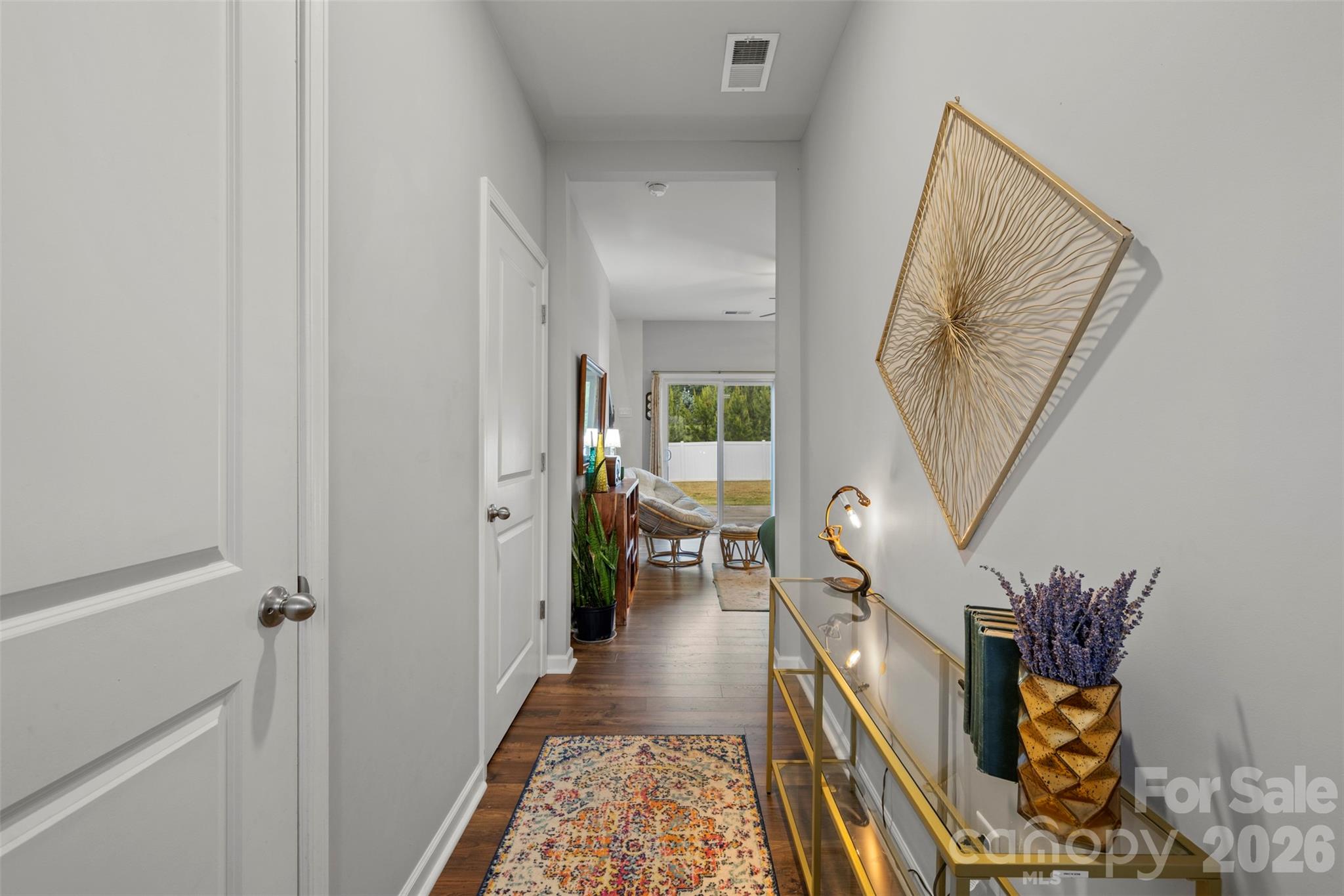 225 Final Stretch Lane Clover, SC 29710 - Photo 12 of 39 a view of a hallway with wooden floor and entryway
