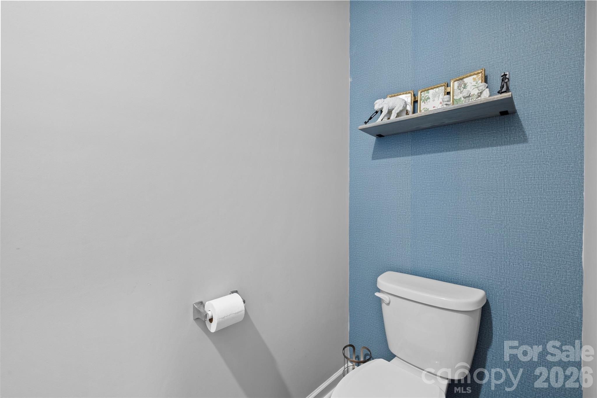 225 Final Stretch Lane Clover, SC 29710 - Photo 15 of 39 a white toilet sitting next to a white wall
