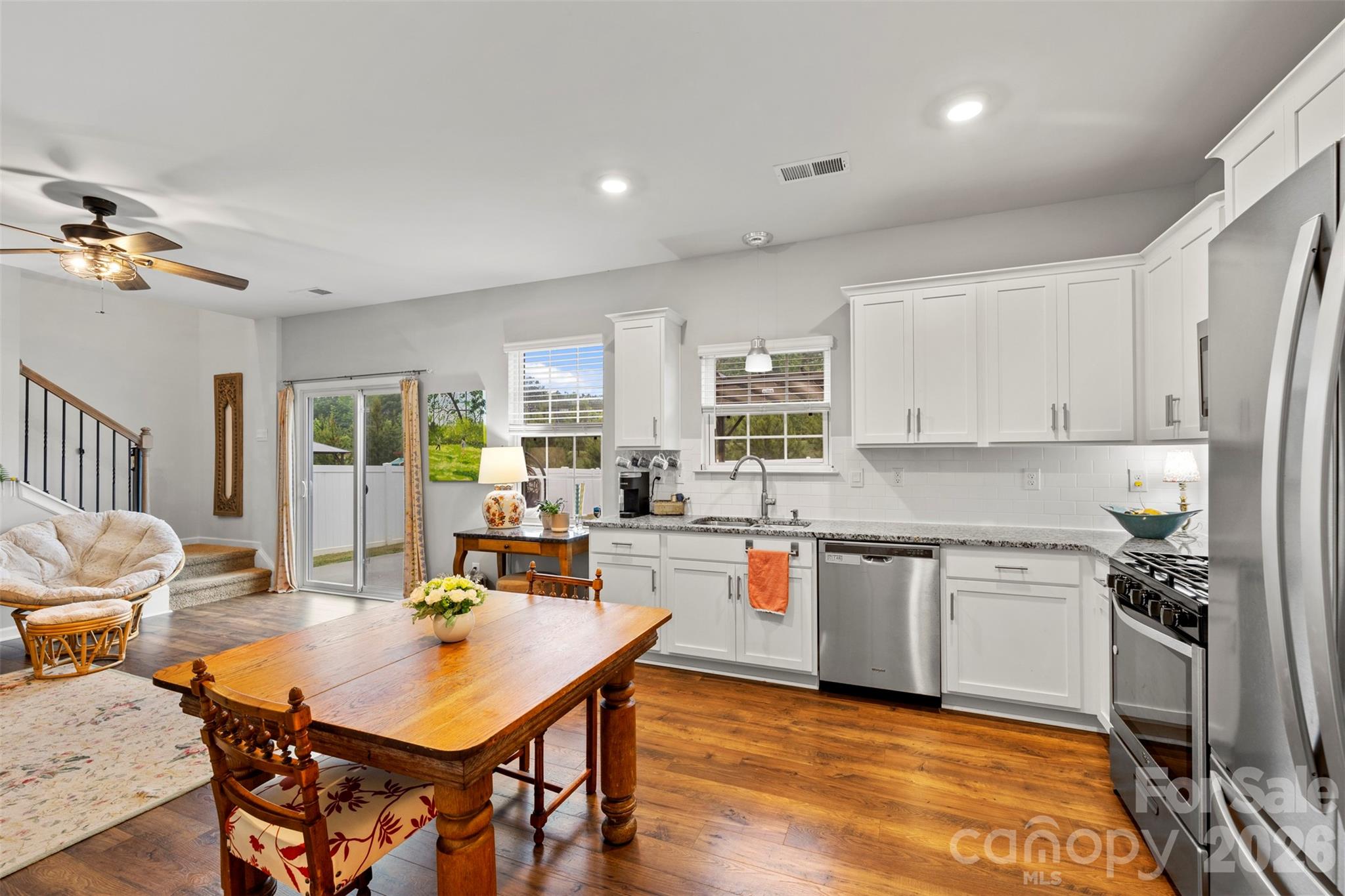 225 Final Stretch Lane Clover, SC 29710 - Photo 19 of 39 a large kitchen with a table and chairs in it