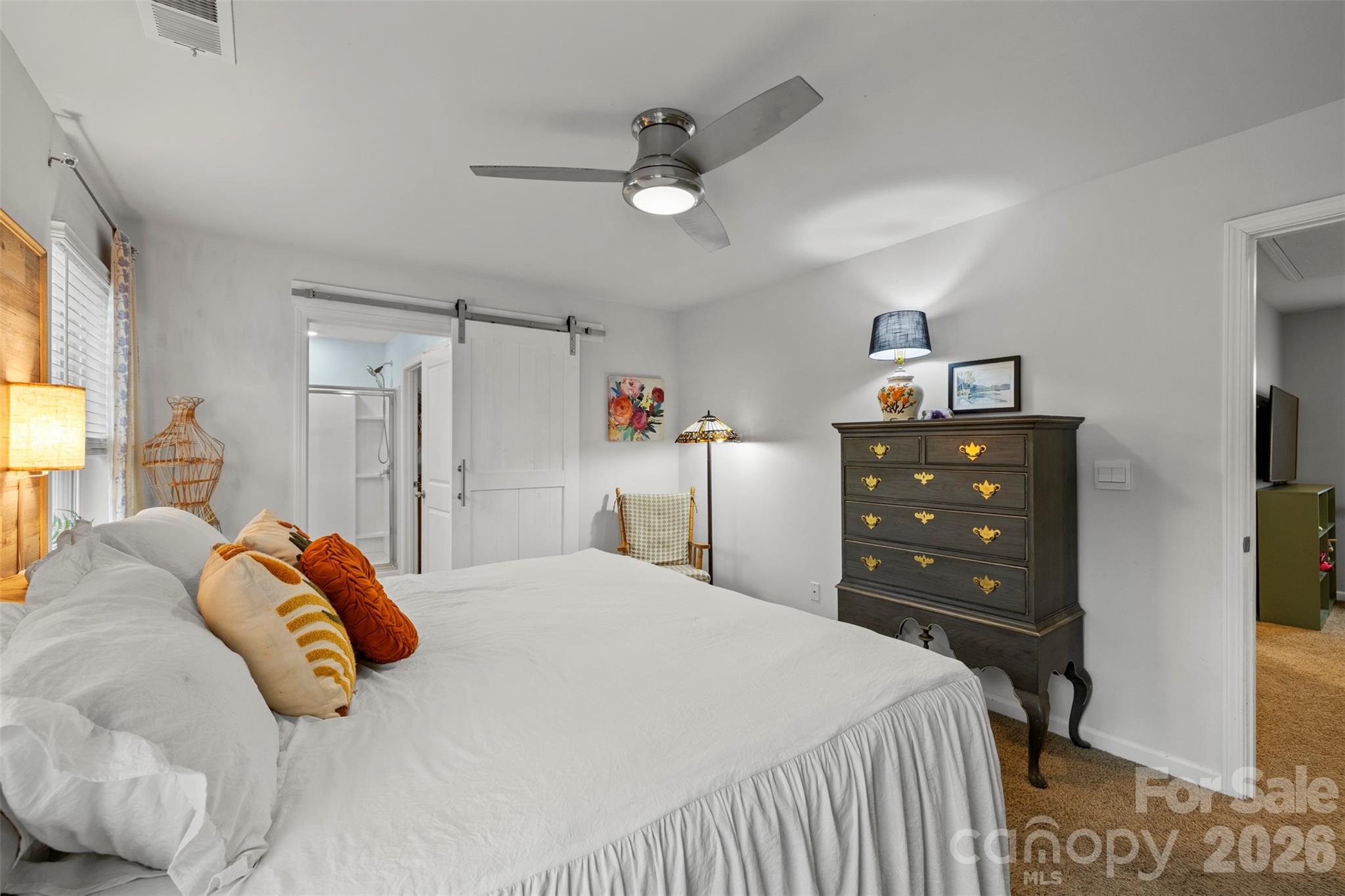 225 Final Stretch Lane Clover, SC 29710 - Photo 22 of 39 a bedroom with a bed and a dresser