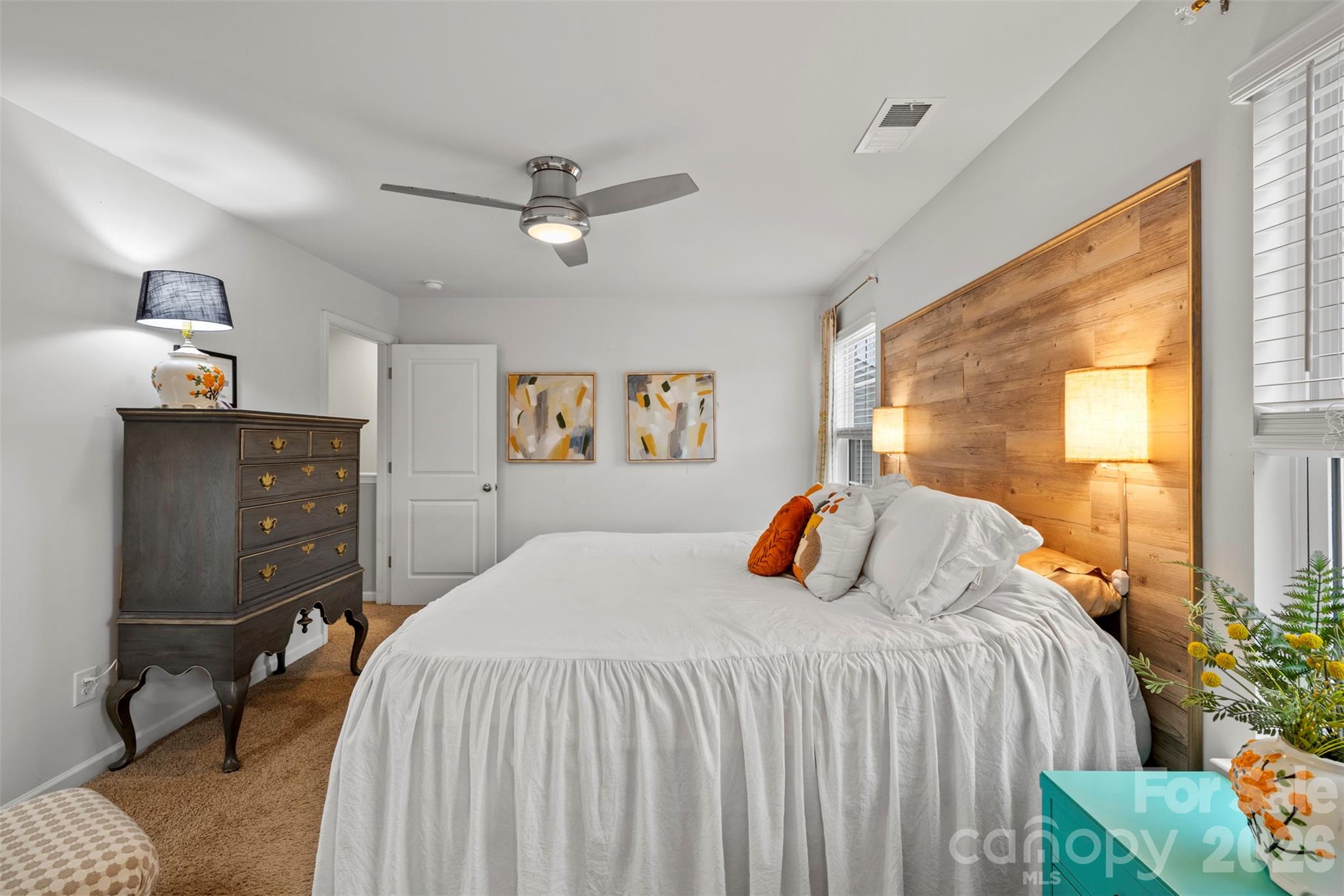 225 Final Stretch Lane Clover, SC 29710 - Photo 23 of 39 a bedroom with a bed and wooden floor