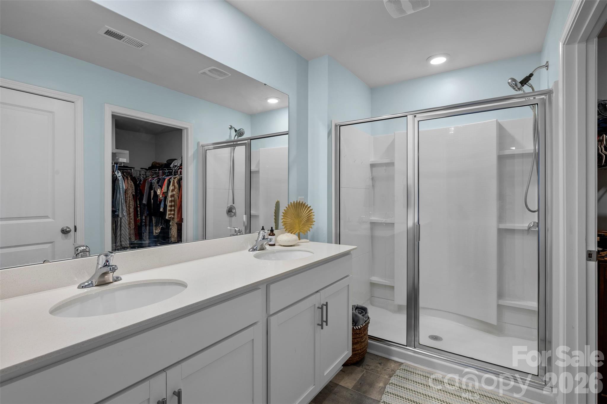 225 Final Stretch Lane Clover, SC 29710 - Photo 24 of 39 a bathroom with a granite countertop sink mirror and shower