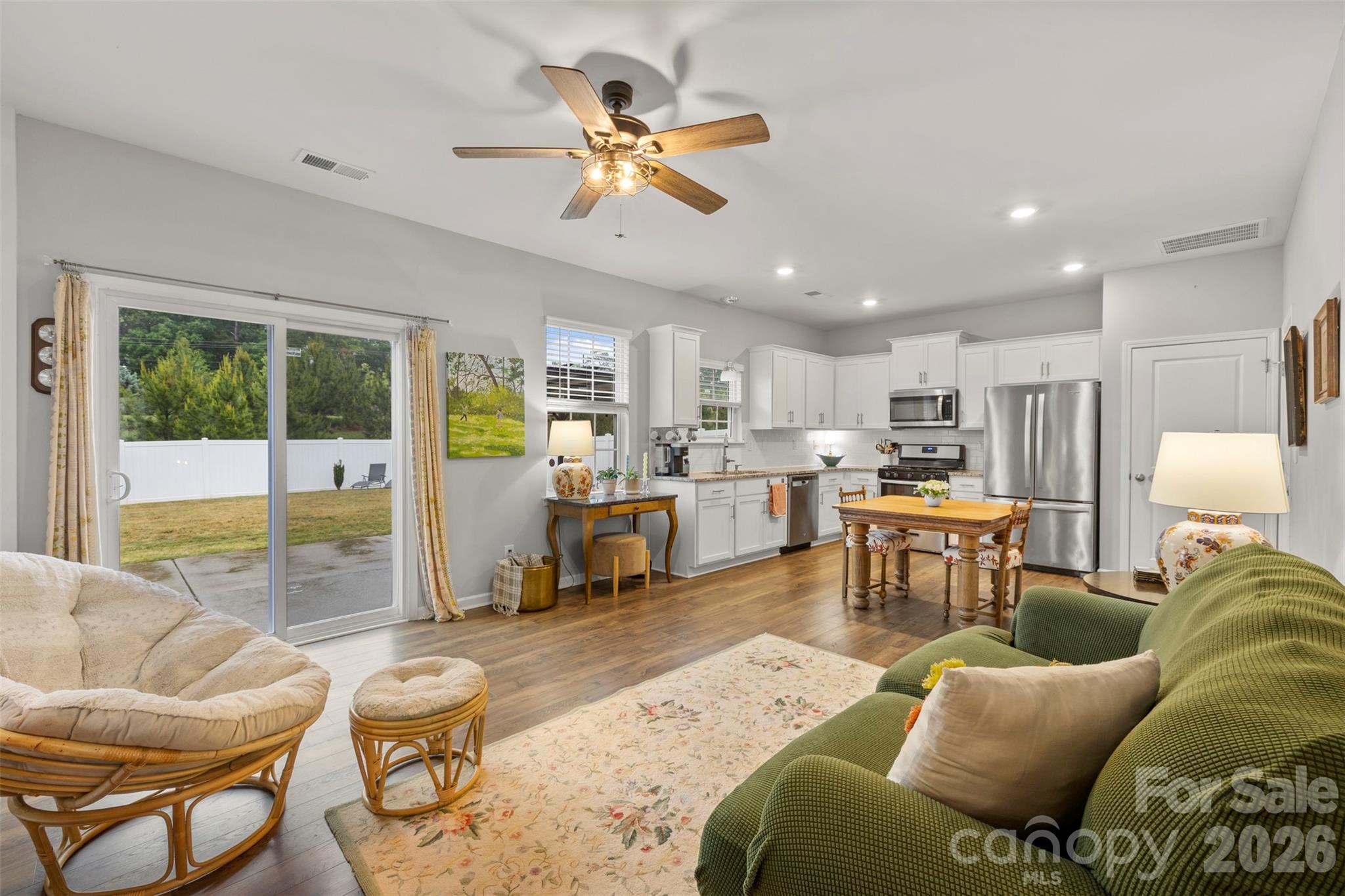 225 Final Stretch Lane Clover, SC 29710 - Photo 3 of 39 a living room with furniture kitchen view and a large window