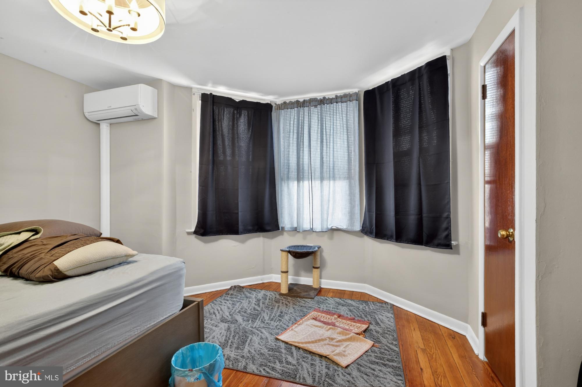 3147 Edgemont Street Philadelphia, PA 19134 - Photo 20 of 23 a bedroom with bed and a window