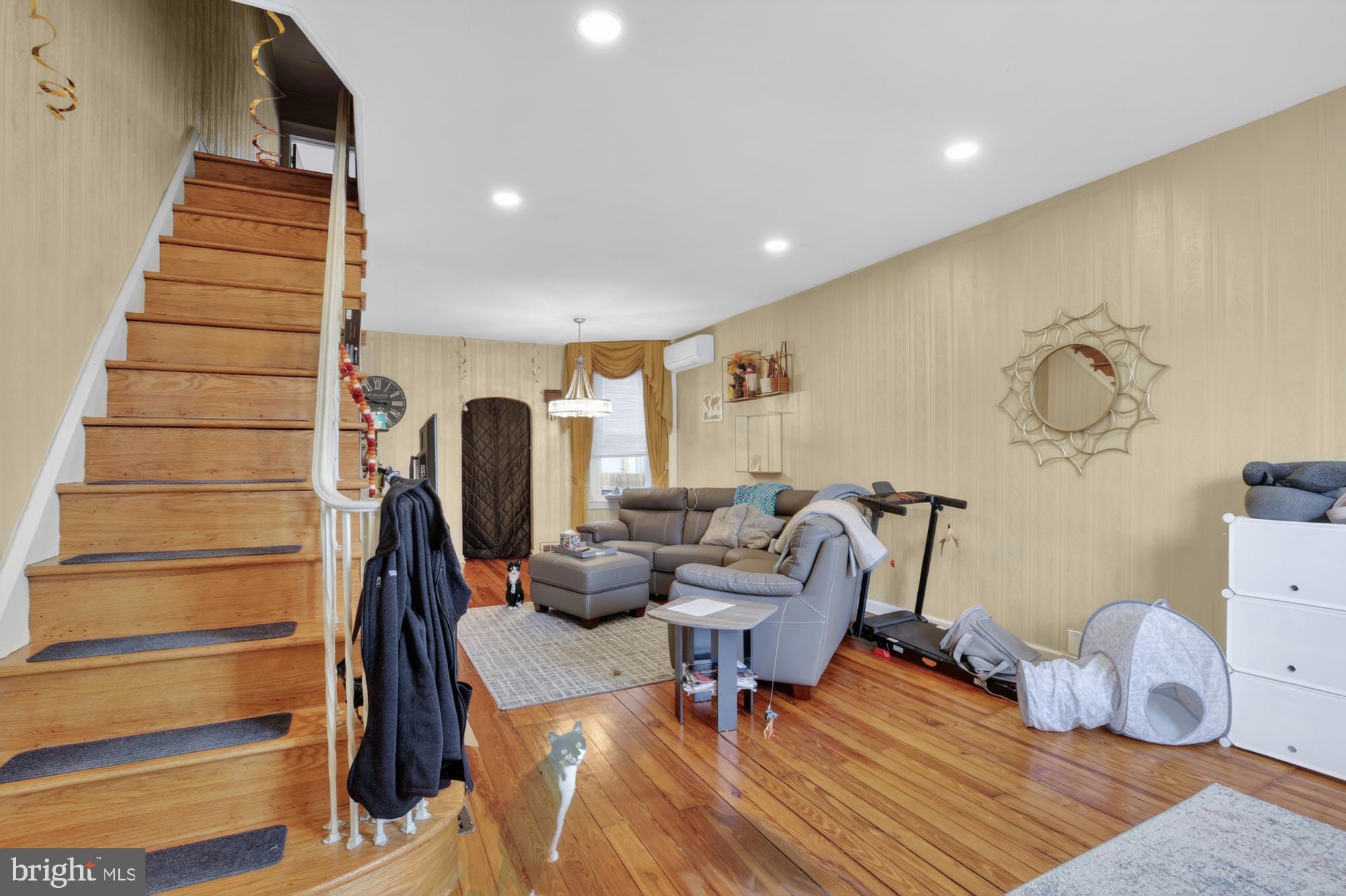 3147 Edgemont Street Philadelphia, PA 19134 - Photo 3 of 23 a living room with furniture and wooden floor