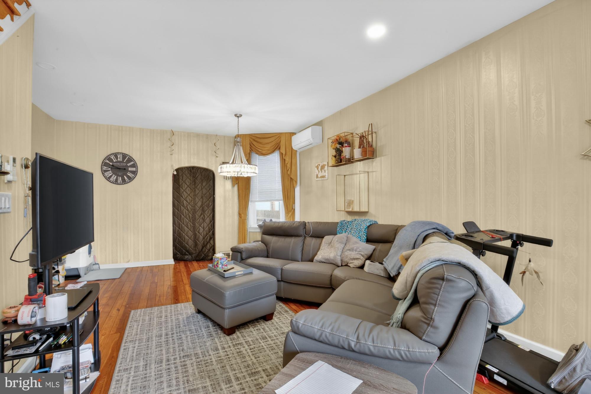 3147 Edgemont Street Philadelphia, PA 19134 - Photo 4 of 23 a living room with furniture and a flat screen tv