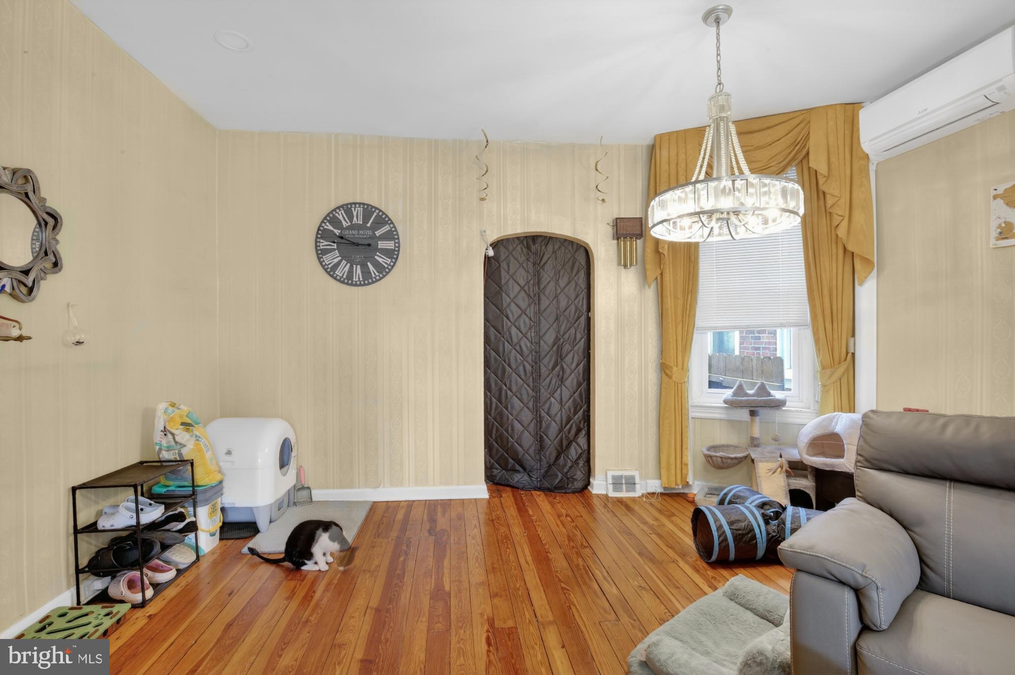 3147 Edgemont Street Philadelphia, PA 19134 - Photo 5 of 23 a view of a livingroom with furniture and a window
