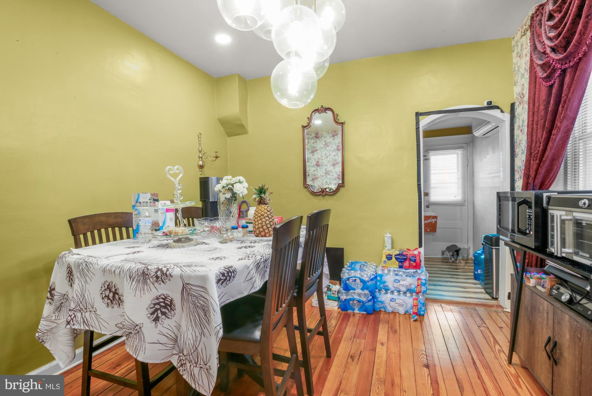 3147 Edgemont Street Philadelphia, PA 19134 - Photo 6 of 23 a dining room with furniture and wooden floor