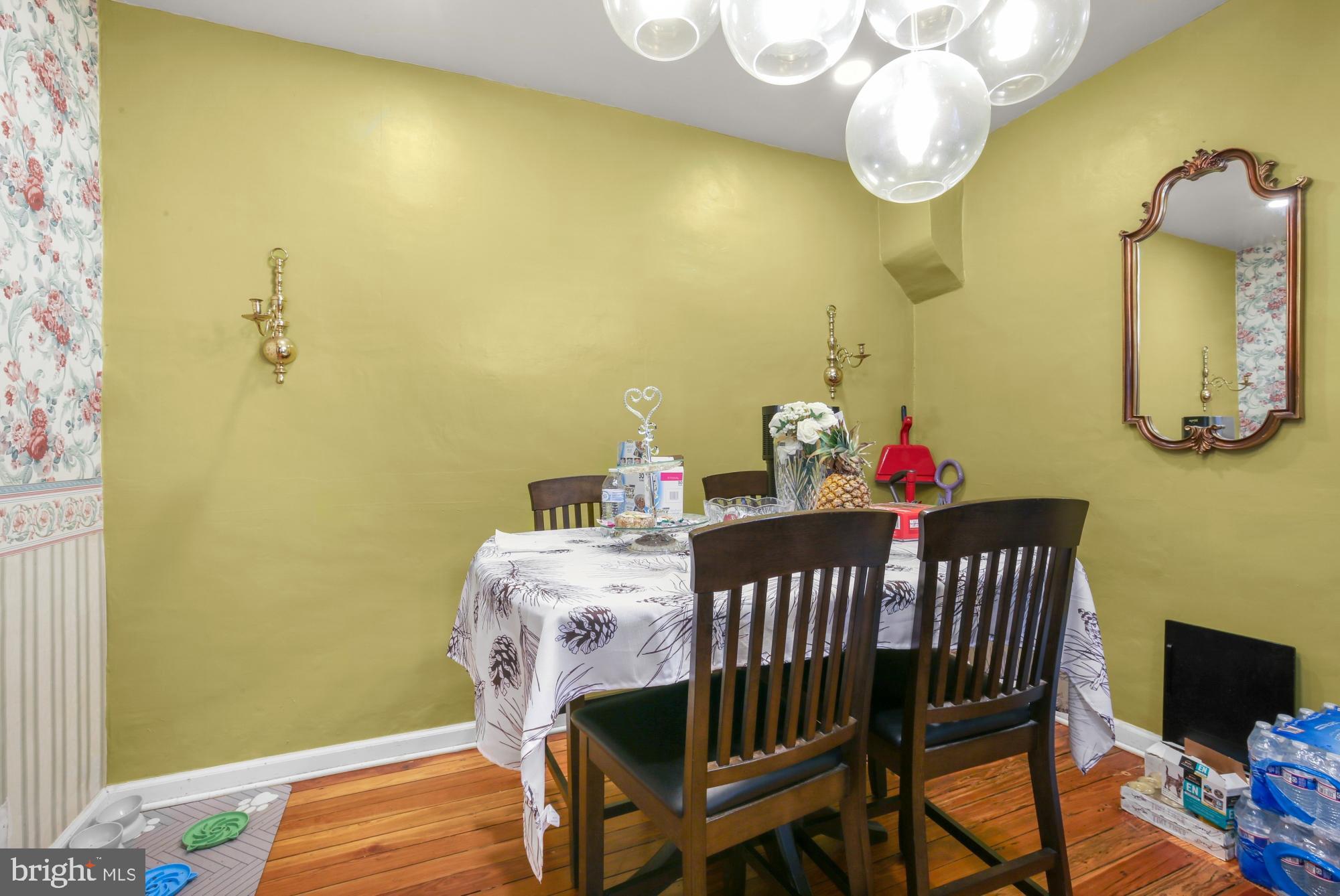 3147 Edgemont Street Philadelphia, PA 19134 - Photo 7 of 23 a view of a dining room with furniture and chandelier