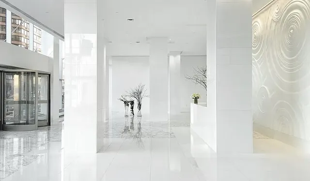 a view of a bathroom with a glass shower door