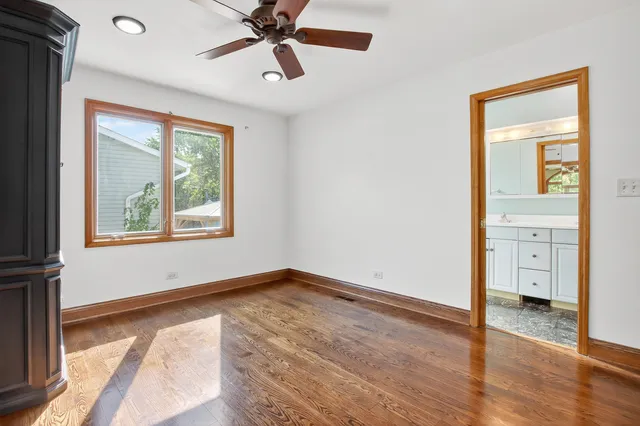 a bathroom with a sink toilet and mirror