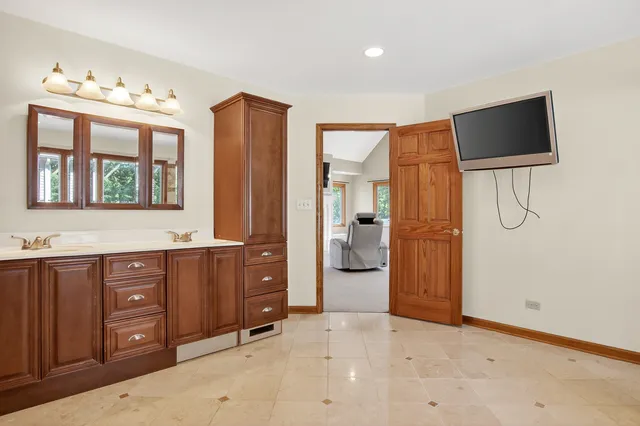 a view of room with wooden floor