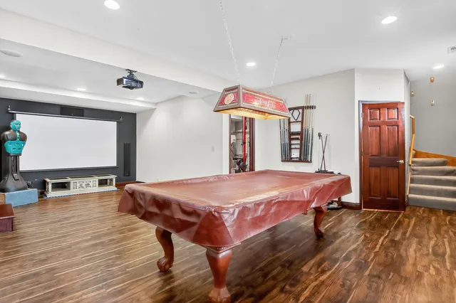 an aerial view of a house with a garden and plants