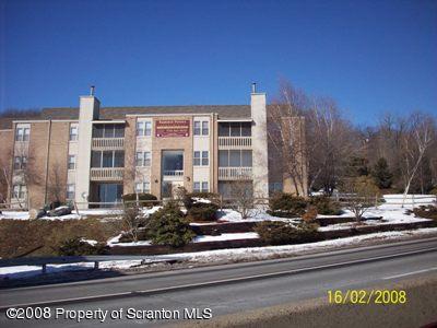 1407 Summit Pointe Scranton, PA 18508 - Photo 1 of 11 a front view of a building with street view