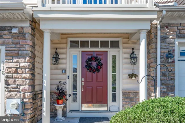 a view of building with glass windows and door