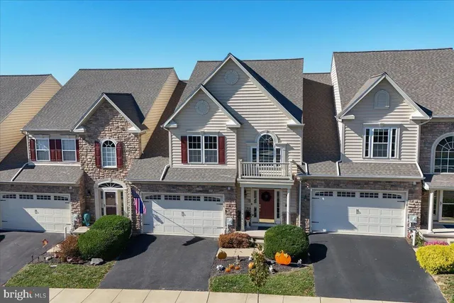 a front view of residential houses