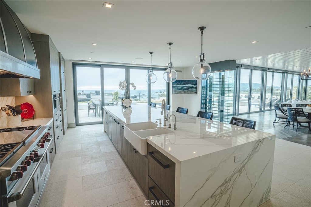 5 Pacific Ridge Place Dana Point, CA 92629 - Photo 22 of 67 OCEAN VIEWS AND ABUNDANT NATURAL LIGHT ARE JUST ONE OF THIS KITCHEN'S HIGHLIGHTS