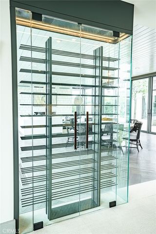 a bedroom with a bed wooden floor and a fireplace