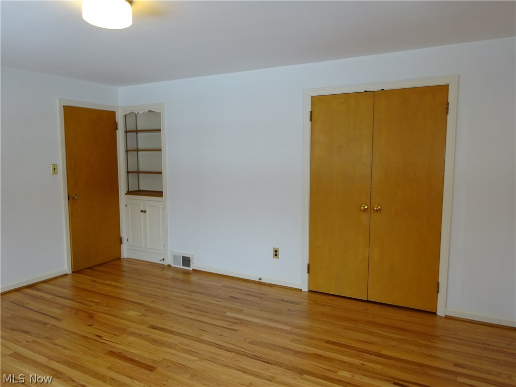 2927 Weymouth Road Cleveland, OH 44120 - Photo 21 of 29 All bedrooms have good closet space. Third bedroom also has built-in storage and shelves.